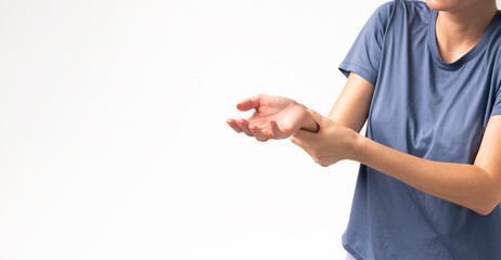 Close-up shot of a young athletic girl with a sore arm