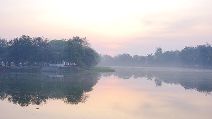 Obraz premium Landscape of foggy lake in the morning,Thailand.