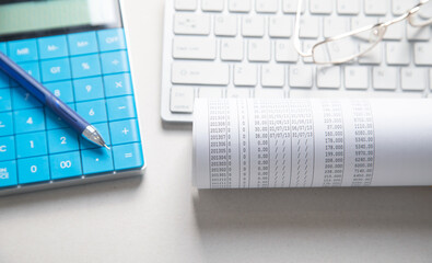 Financial accounting with a calculator and pen. Finance