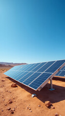 Solar Panels Installed in a Remote Arid Desert Area Under a Clear Blue Sky