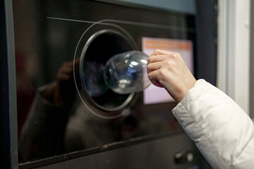 Machine for accepting plastic and aluminum beverage bottles. Ecological recycling of beverage waste.