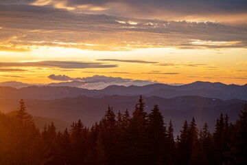 Cloudy sky block sunrise over mountain