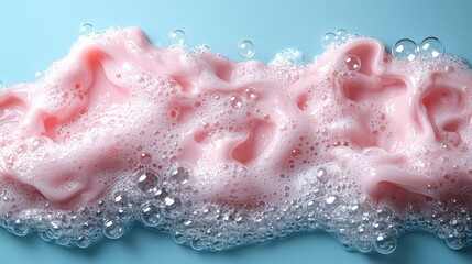 Vibrant Pink Foam on Blue Surface