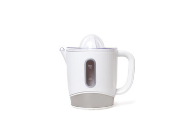 An electric citrus juicer on a white background with copy space