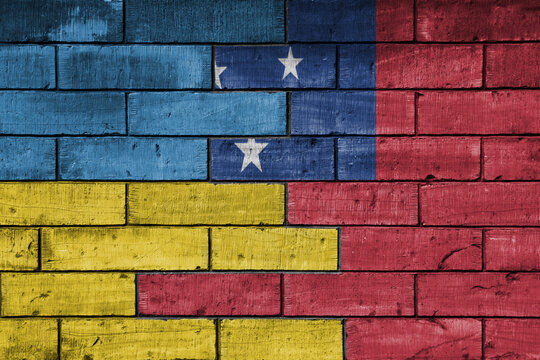 colourful painted big flag of ukraine and flag of Samoa on a massive old brick wall background. concept