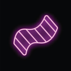 Neon pink towel is glowing on a dark background