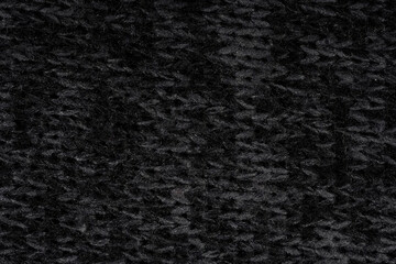 Macro Close-Up of Black Fabric with Interwoven Threads
