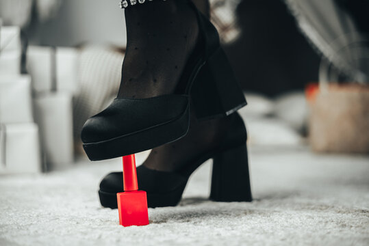 Red nail polish under pressure