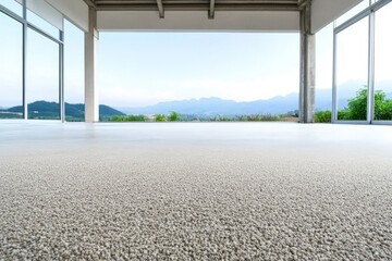 Fototapeta premium Spacious modern interior with carpet and panoramic mountain view at dawn