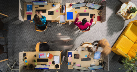 Top Down View with Motion Blur Team of Managers and Specialists Working in a Creative Agency...