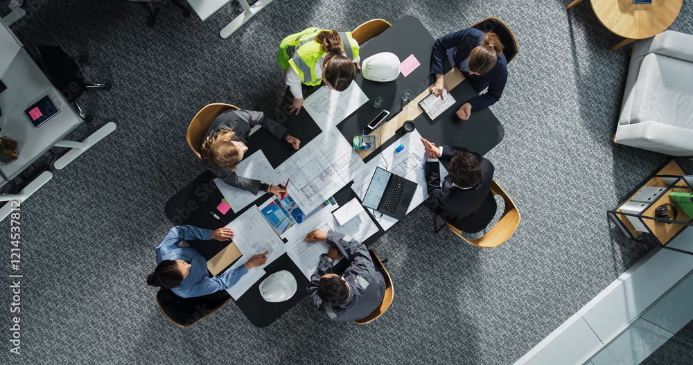 Aufkleber top down view of diverse team of real estate construction engineers working with blueprints and docu