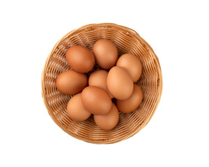 Brown eggs in a basket isolated over white background