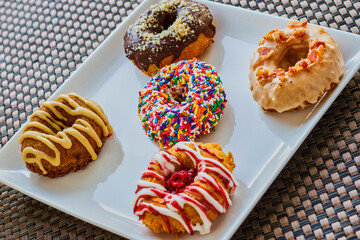 plate of assorted doughnut flavors