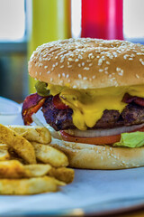 classic bacon cheeseburger served with French fries