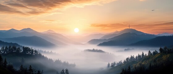 Fototapeta premium Serene Sunrise Over Misty Valley with Mountain Silhouettes and Clouds