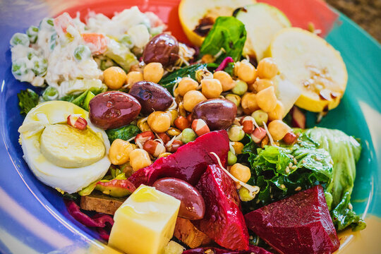 chickpea salad with olives, hard boiled eggs, and beets