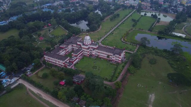 Historical monument Cooch Behar royal Palace surrounded by beautiful parks on the bank of River Torsa in Cooch Behar city, West Bengal, Drone view