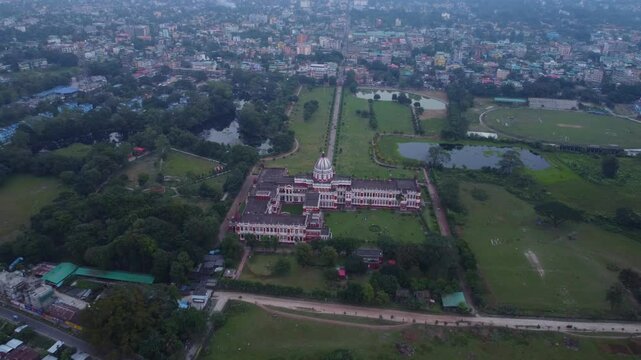 Historical monument Cooch Behar Palace on the bank of River Torsa in Cooch Behar city, West Bengal, Panoramic drone view