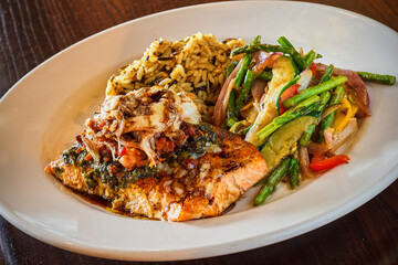 pesto salmon with sautéed vegetables