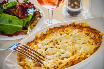 potato gratin with shredded cheese