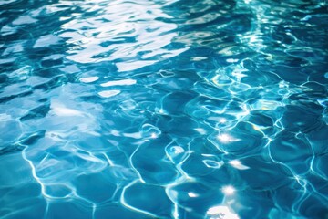 Obraz premium Abstract image of rippling blue water reflecting light creating a calming effect
