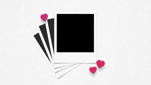 Pile Of Retro Instant Photo Frames With Alpha And 3D Floating Hearts On Paper Background Loop