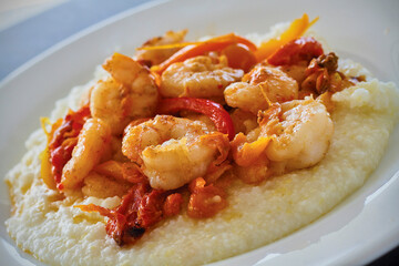 shrimp and grits with a chunky blistered cherry tomato gravy