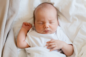 Newborn baby sleep at first days of life. Portrait of sleeping baby