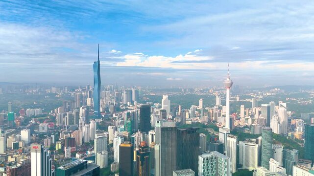 Aerial panorama overview cityscape Warisan Merdeka 118 Tower and Petronas Twin Towers in the capital of Malaysiaa, Kuala Lumpur. 02 December 2024.