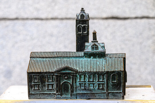 Metal model of a church which is part of the sculpture named El Vecino Curioso, Madrid, Spain