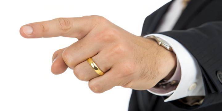 Businessman points with his finger