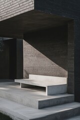Modern architectural bench design featuring a minimalist style and sharp shadows in a contemporary outdoor setting during daytime