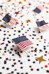 Obraz premium A collection of small American flags placed on a table, suitable for patriotic events or decorations