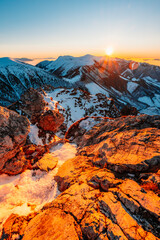 Naklejka premium Winter hiking to Velky Rozsutec in Mala Fatra National park is full of beautiful views. Sunset in Slovakia mountains. Slovakia landscape