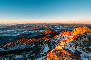 Naklejka premium Winter hiking to Velky Rozsutec in Mala Fatra National park is full of beautiful views. Sunset in Slovakia mountains. Slovakia landscape