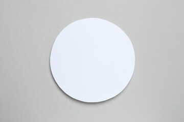 White paper card on gray background
