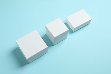 Сardboard boxes on color background