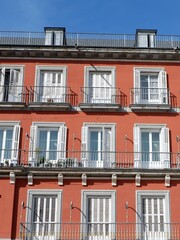 Elegant colourful facade of building in art deco facade. Spanish architecture, vertical photo