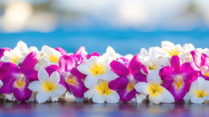 A close-up of an intricate flower garland made of purple orchids and fragrant white blossoms