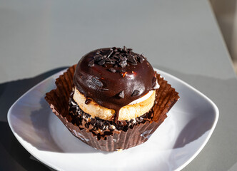 Meringue dessert cake topped with chocolate