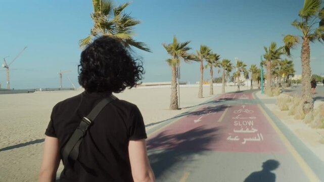girl walking on a beach