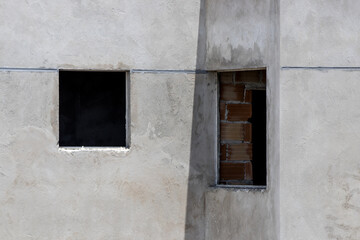 detail of two window openings in masonry and reinforced concrete walls in the construction of a condominium building number 2
