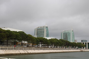 Park of Nations in Lisbon with Sao Gabriel and Sao Rafael Towers seen across the Olivais Dock, Portugal.