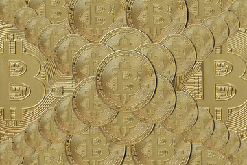 tapeta z monet ozdobnych bitcoina, ułożonych we wzór symetryczny.