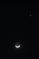 Earthshine is a soft, faint glow on the dark side of the moon. Earthshine occurs when sunlight reflects off the Earth's surface and illuminates the unlit portion of the Moon's surface.