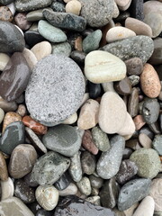 Large stones on the beach near the sea