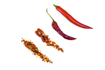 still life with red pepper. whole chili peppers, dried peppers, crushed chili flakes