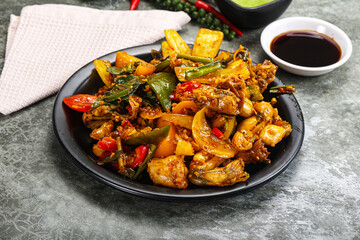 Vietnamese cuisine - fried frog with vegetables