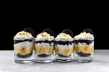 Oreo trifle in a glass of banana. Popular dessert
