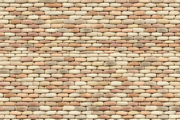 Obraz premium Beige and Pink Brick Wall Texture Creates a Rustic and Seamless Background Design